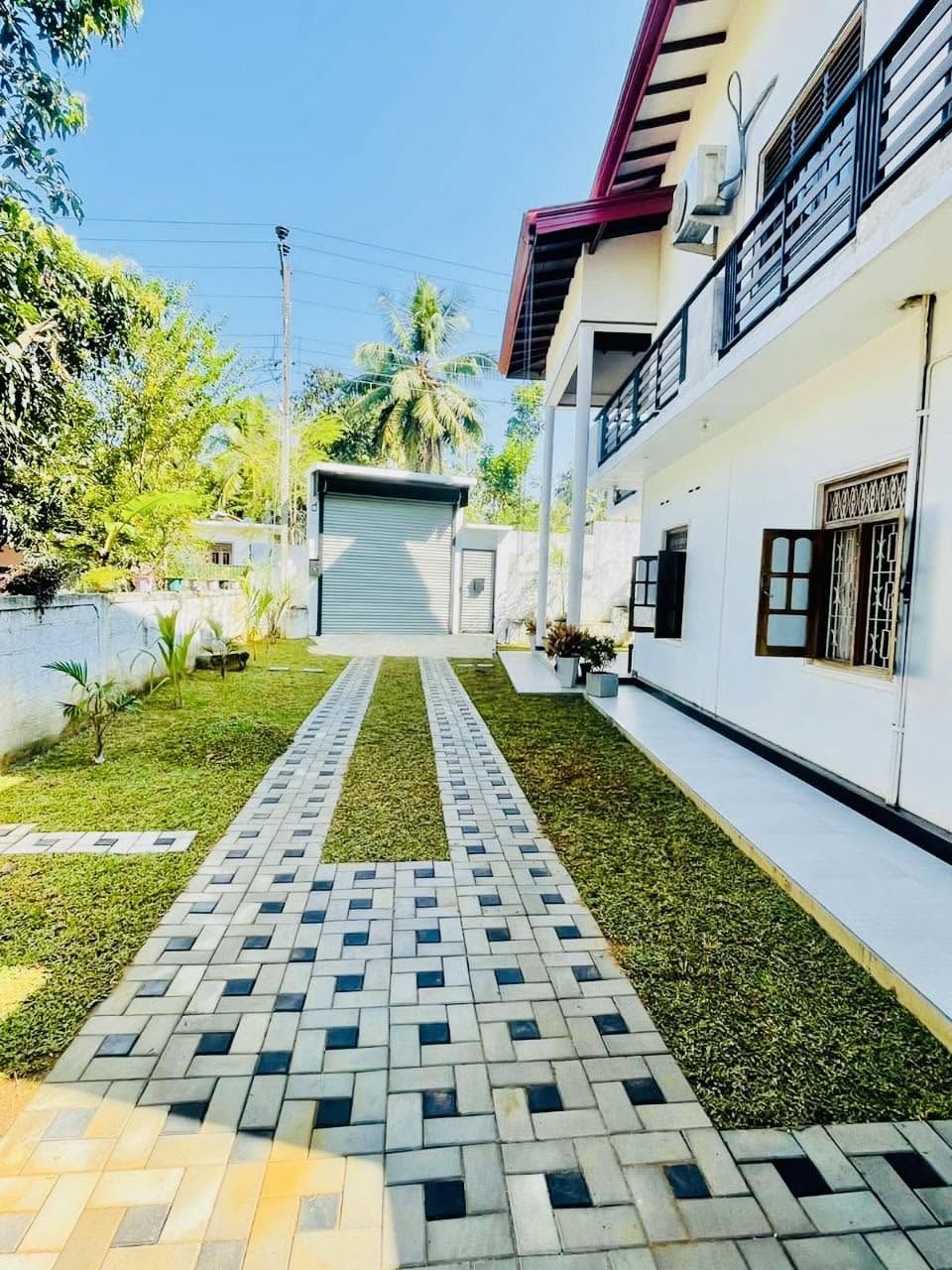 Completed interlock driveway and lawn landscaping project
